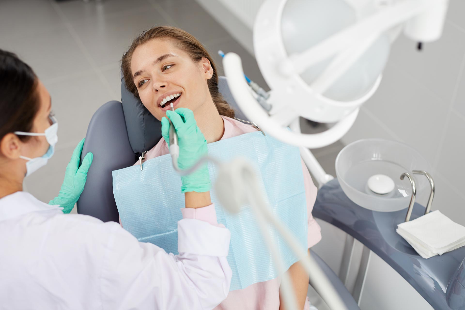 young-woman-at-dental-exam-3XD85GH.jpg